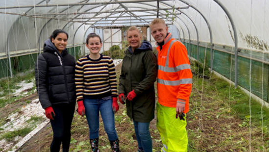 National Highways digs deep to help two community gardens in Sandwell