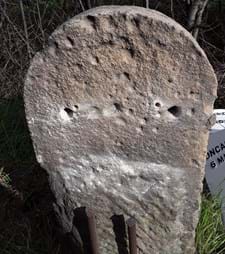 Damaged stone marker