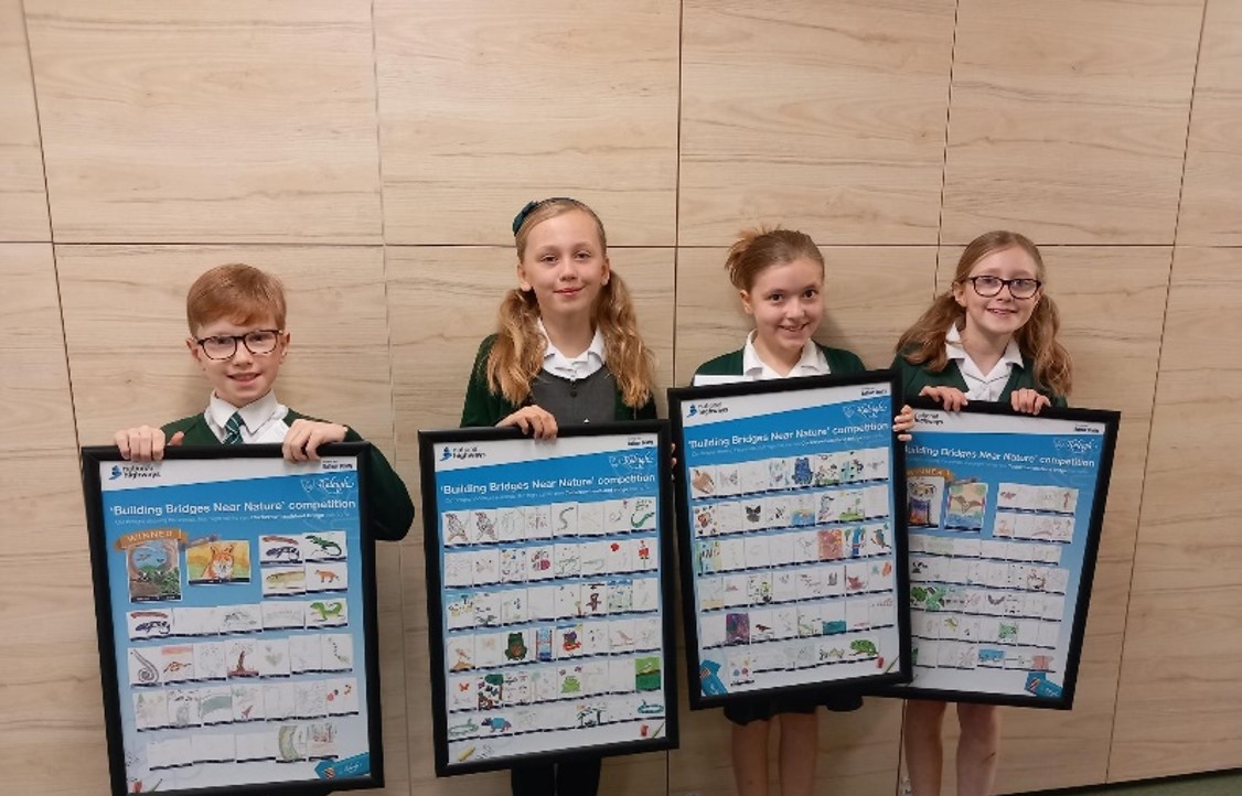 Students showing off their creative work