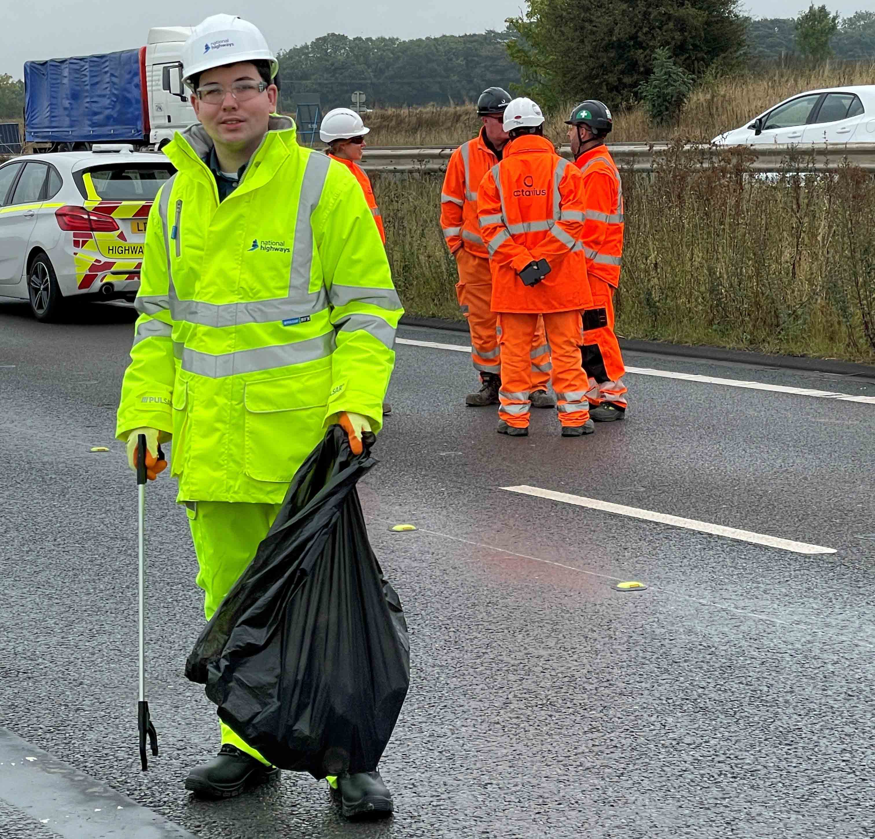 James collecting litter