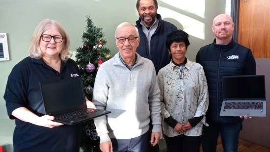National Highways donate laptops to community group for digital and online support 