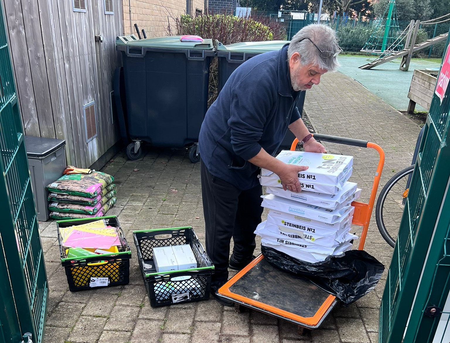 Ethstat employee helping with the move