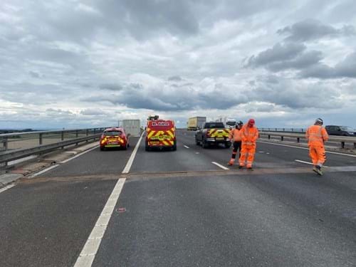 Road workers on Ouse Bridge, M62