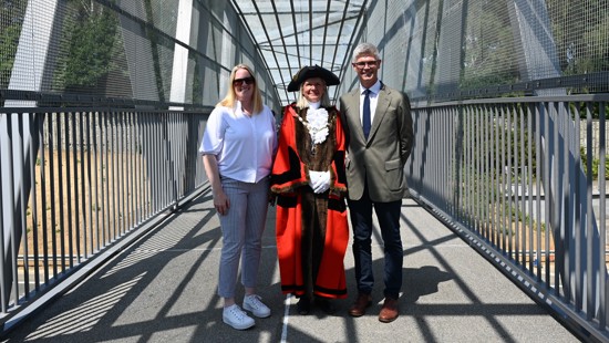 New and improved footbridge crossing the M3 in Surrey opens to the public