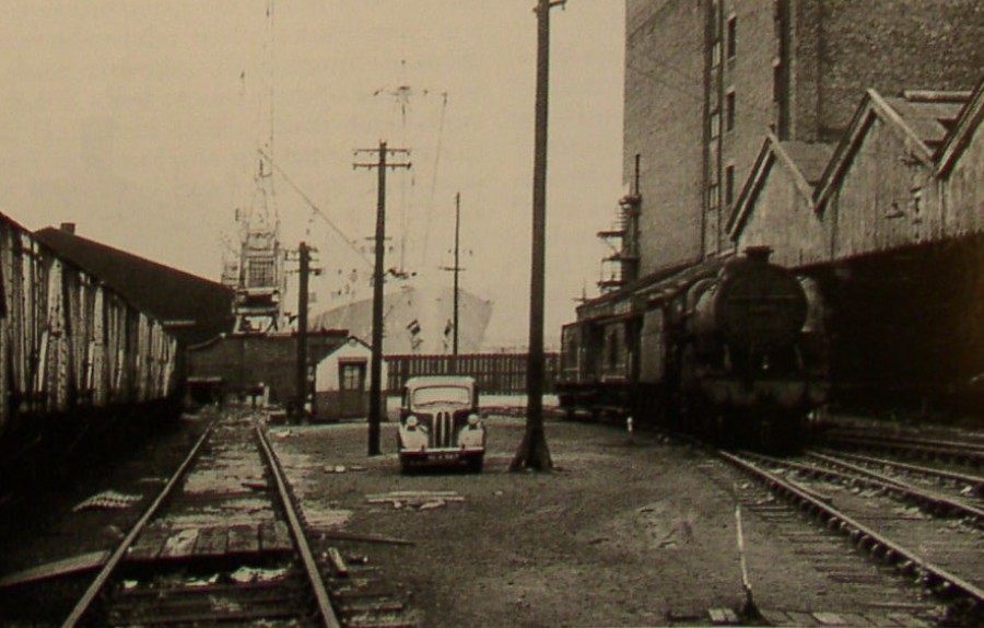 Corner of Bankfield Goods Depot 1963 freighters using Canada dock can be seen in the in background. Copyright JA Sommerfield