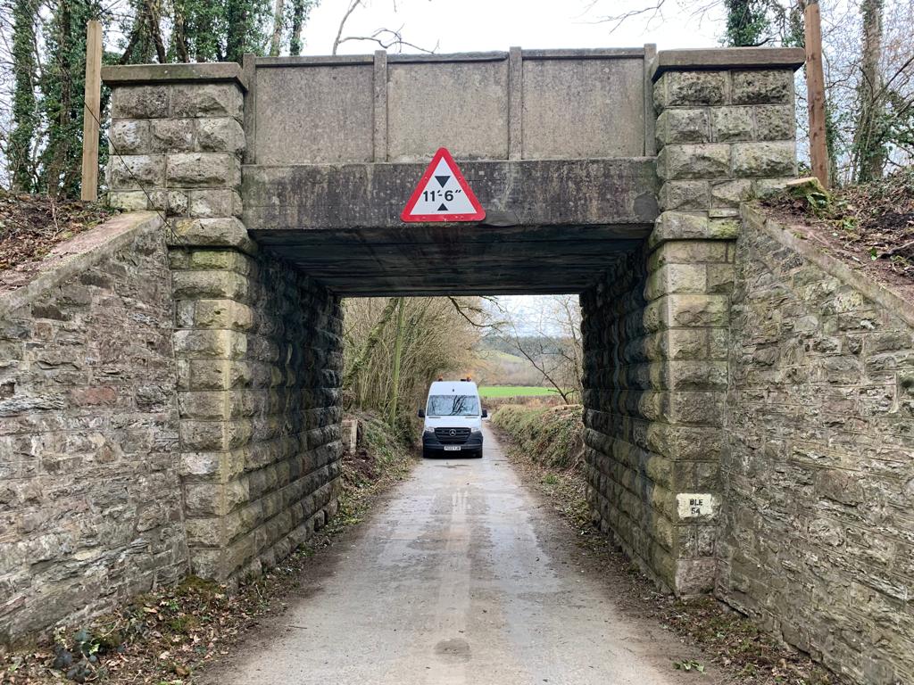Dyer & Butler then gave the bridge some additional care and attention repointing sections of brickwork. Logs from the trees that were felled to prevent any further damage to the structure were offered to residents.
