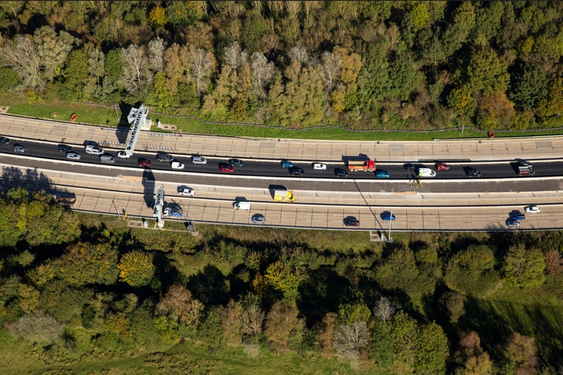 View from on high of the new overlay completed eastbound lanes 3 and 4 asphalt surfacing