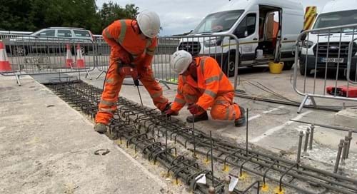 Two road engineers working on the bridge deck at Wentbridge Viaduct
