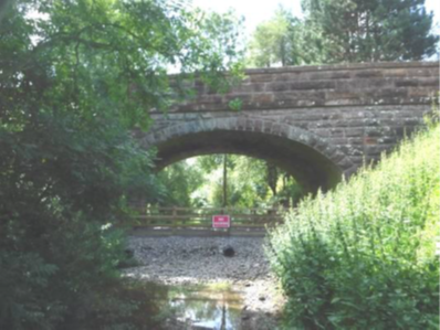 photo of Great Musgrave bridge taken after we install clean stone and a four post fence both sides of the arch