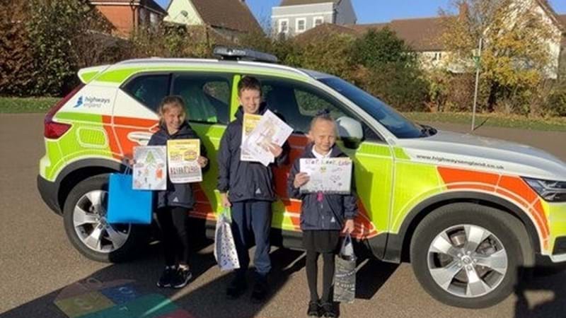 School children show off artistic skills in road safety poster competition