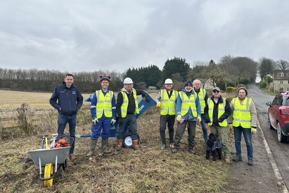 Members of Birdlip Gardening Cooperative keeping verges clear and well maintained.