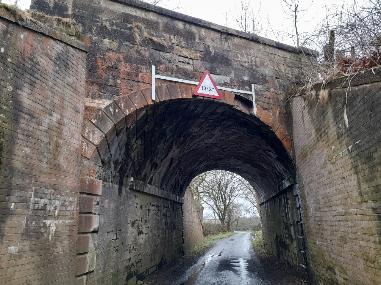 Bridge showing missing section of stone from arch