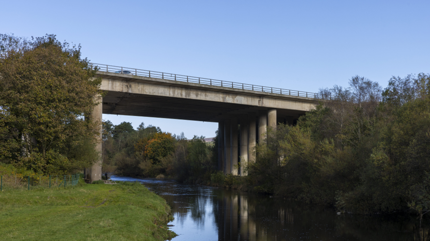 Tebay crosses the River Lune close to the West Coast Main Line at the end of junction 38 slip roads.