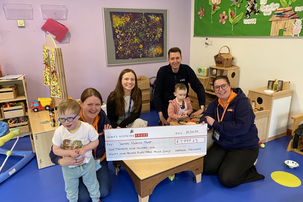 Children and staff with some of the new play equipment at JHT