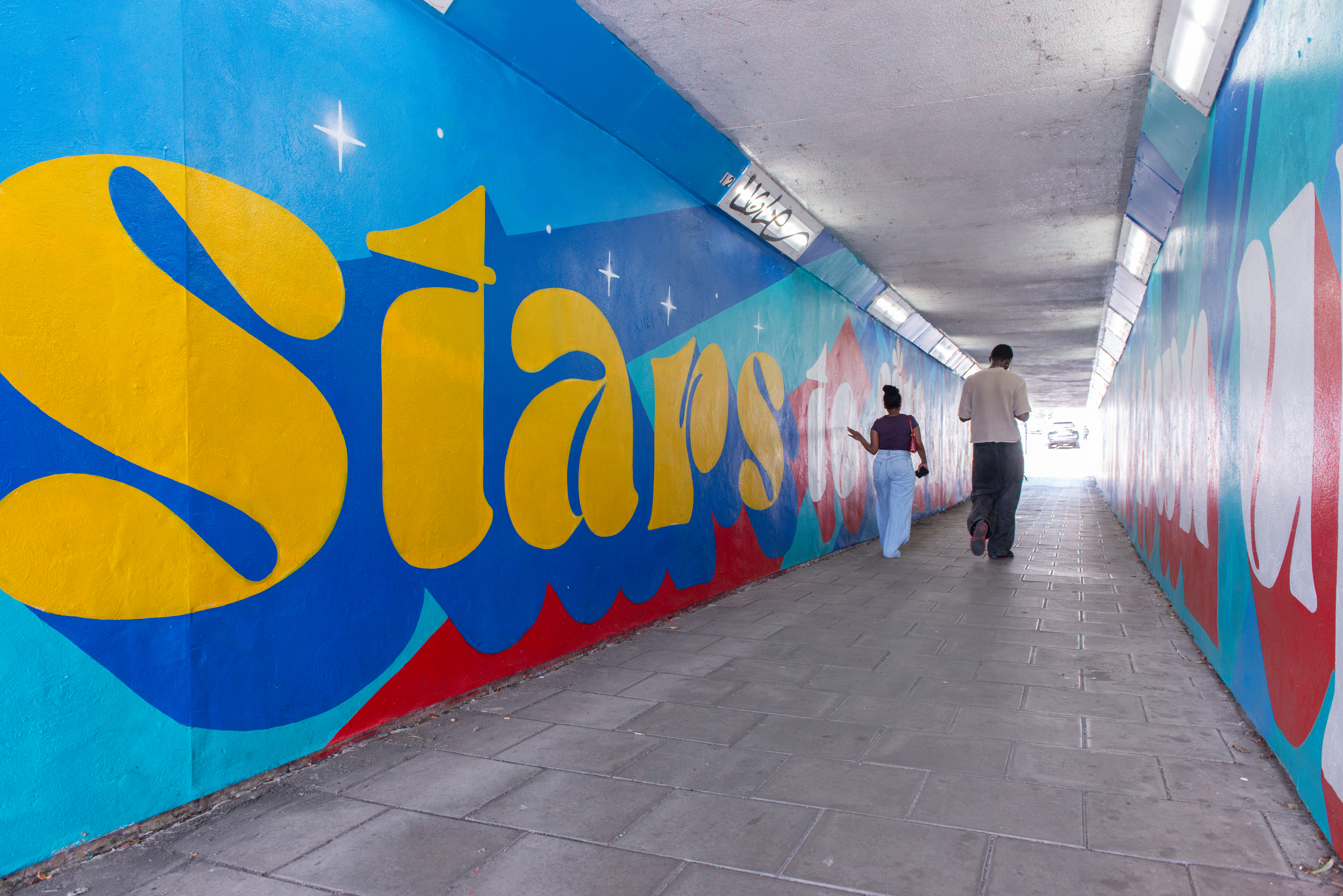 Pedestrians using the redecorated Sandwell underpass