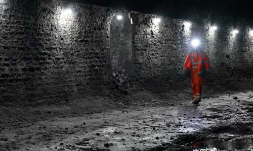 Worker carries out check of tunnel