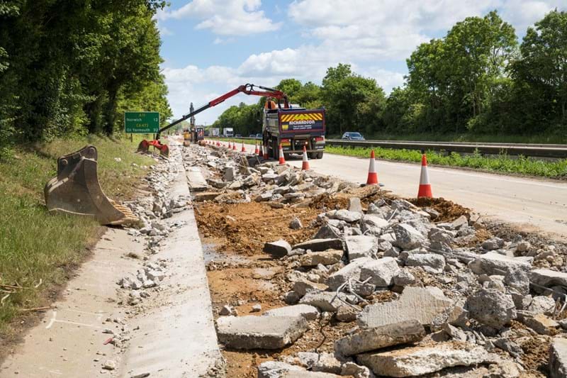 Break up and removal of existing concrete using a grab-lorry