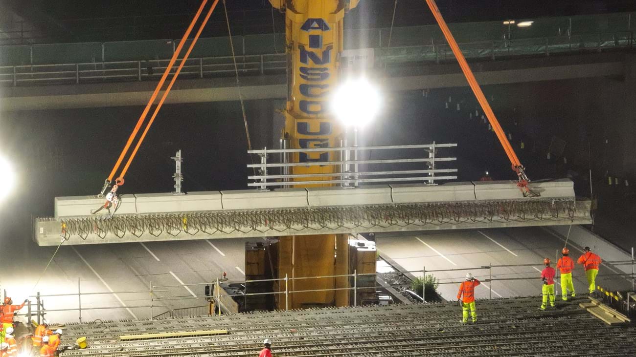 Saturday evening: By 10pm, the first huge edge beam is being moved into place