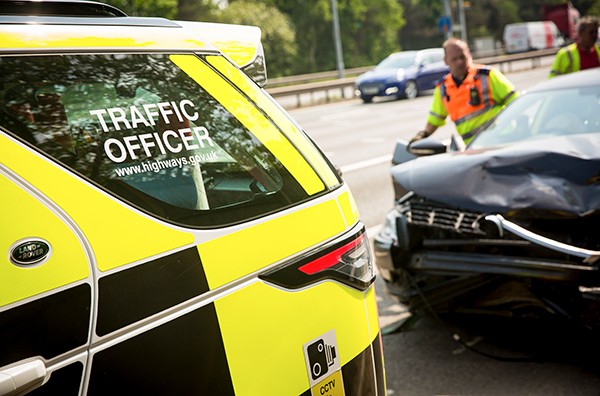 Highways england traffic officer attending a collision 