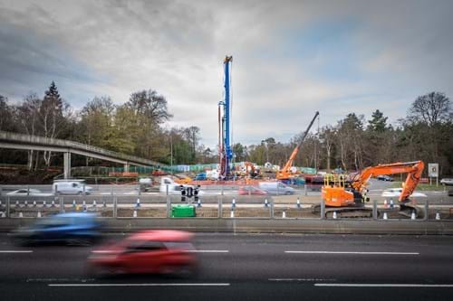 Photo of piling rig (used for drilling foundations) at the entrance to Wisley Lane on the A3