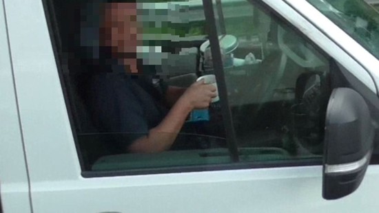 Driver caught sipping mug of tea and removing both hands from wheel by police in unmarked National Highways HGV cab